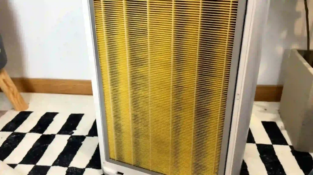 Air purifier with detachable yellow filter captures airborne cat and dog fur indoors, reduces floating pet hair that sticks to laundry, clothes, couch and carpet, effective whole home tool to control cat shedding mess